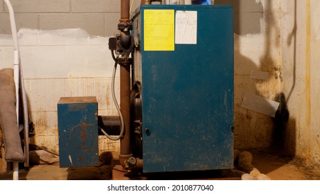 An Oil Furnace In A Basement