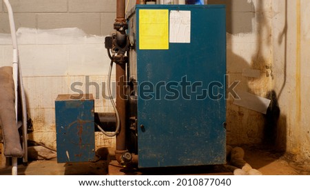An Oil Furnace in a Basement
