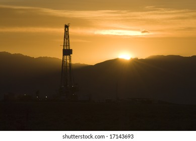 Oil And Gas Drilling Rig At Sunrise In Wyoming