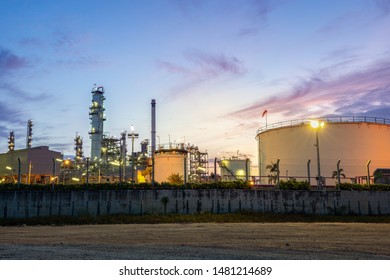 Oil And Gas Industrial,Oil Refinery Plant Form Industry,Refinery Factory Oil Storage Tank And Pipeline Steel With Sunset And Cloudy Sky Background,Thailand