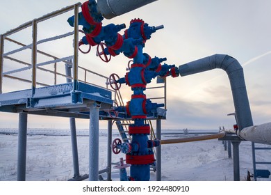 Oil, Gas Industry. Group Wellheads And Valve Armature , Gas Valve, Gas Well Of High Pressure; Gas Production Process