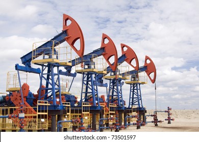 Oil And Gas Industry. Work Of Oil Pump Jack On A Oil Field.