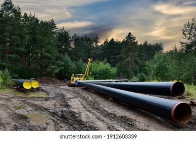 Oil and Gas Pipeline Construction. Natural Gas and Crude oil  transmission in pipe from gas storage and plant development to facility. Building of transit petrochemical pipes in forest area. 