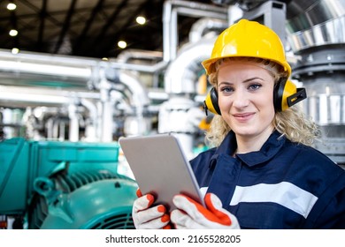 Oil And Gas Production And Industrial Female Worker Holding Tablet Computer.