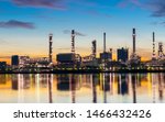 Oil and gas refinery industry plant with glitter lighting and sunrise in the morning, Factory of petroleum industrial, Per plant,Energy power station area. Industry 