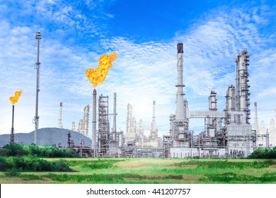 Oil And Gas Refinery Plant With Flare Stack On Blue Sky Background , Petrochemical Plant , Petroleum