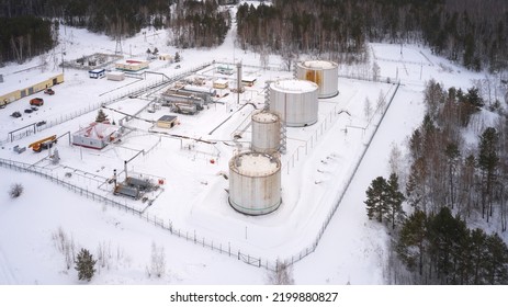 Oil Industry. Winter. Booster Pumping Station For Collecting Oil And Gas With Their Subsequent Transportation To The Pipeline. Shooting From A Drone. Selective Focus.