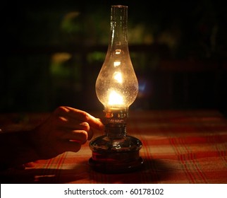 Oil Lamp Lighting Up The Darkness