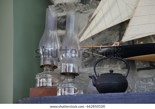 Oil Lamps Cast Iron Tea Kettle Stock Photo Edit Now 662850100