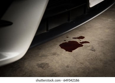 Oil Leak Or Drop From Engine Of Car On Concrete Floor , Check And Maintenance Auto Service