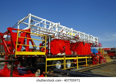 Oil pipe and oil drilling rig equipment - Shutterstock ID 407705971