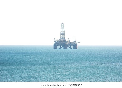 Oil Platform In The Caspian Sea Isolated On The White