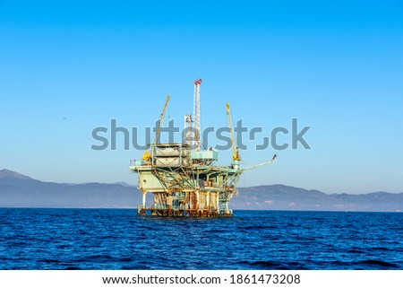 An oil platform off the coast of Santa Barbara run by Exxon Mobile produces crude that is converted to gasoline.

