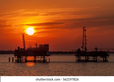 Oil Platform Silhouette In Gulf Of Mexico