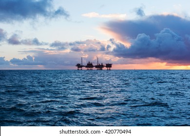 Oil Platform At Sunset
