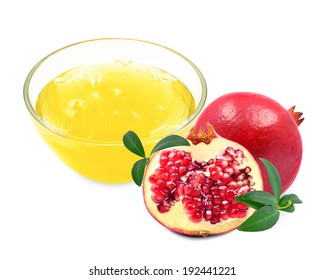 Oil Of Pomegranate In A Bowl On A White Background 