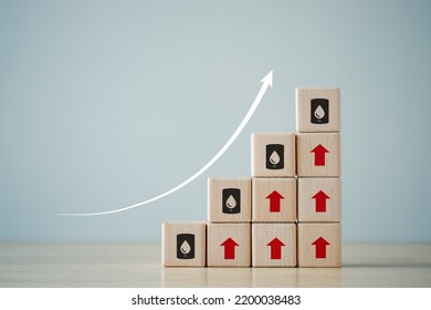 Oil Price Trend Increase. Crude Oil Price Stock Exchange Trading Up. Petroleum Symbol On Ladder Of Wooden Block With Arrow Up. Falling Or Rising Oil Prices. Risk Of War Or Crisis Has Raised The Price.