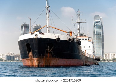 Oil Products Tanker Ship In Front Of Limassol Cityscape. Cyprus