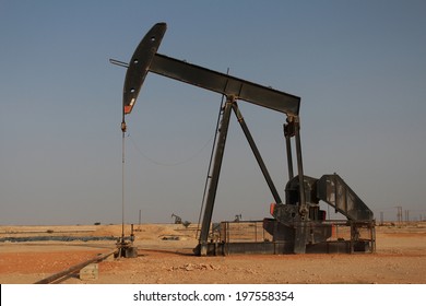 Oil Pump In The Desert Of Oman