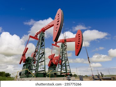 Oil Pump Jacks On A Oil Field 