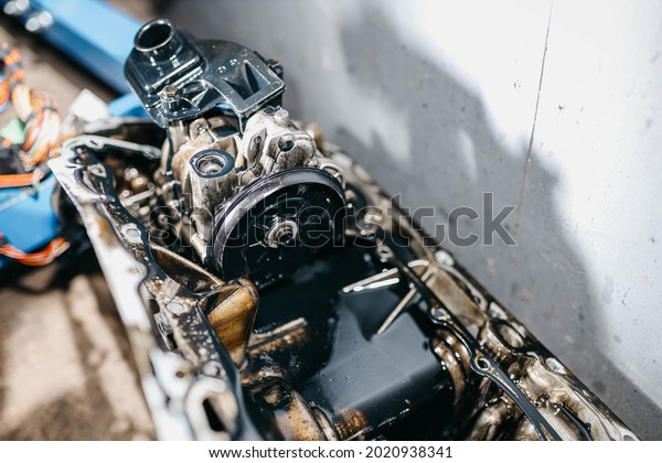 oil pump in the oil\
pan of a car engine.