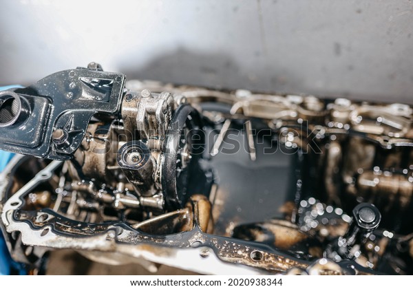 oil pump in the oil\
pan of a car engine.