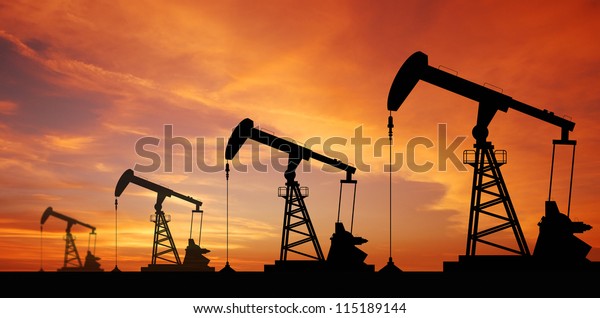 Oil pump oil rig energy industrial\
machine for petroleum in the sunset background for\
design