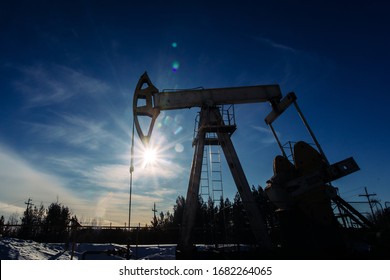 Oil Pumpers Pump Oil In The Field