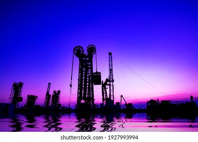 Oil Pumping Machinery In Operation, Crude Oil Extraction Scene In The Night, North China