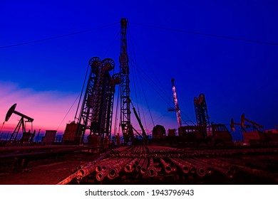 Oil Pumping Machinery In Operation, Crude Oil Extraction Scene In The Night, North China