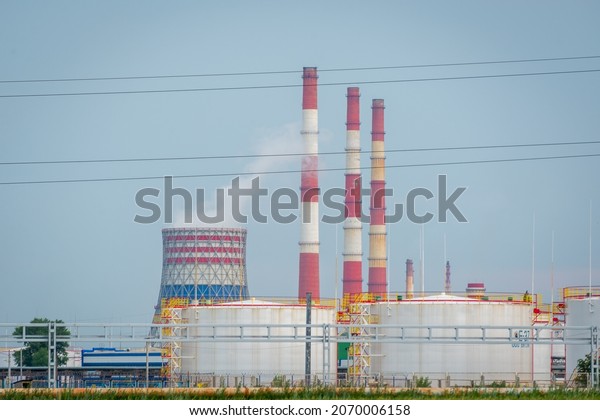 Oil refinery, gas plant. Pipes of the plant and\
the plant.