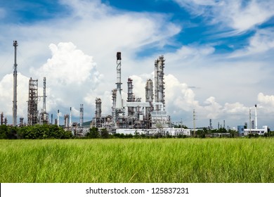 Oil Refinery Plant Against Blue Sky