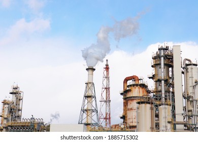 Oil Refinery Plant Chimney And Flare Stack.