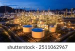 Oil Refinery plant at sunset. Gas Chemical Equipment Prodiction import export Concept, Crude Oil Refinery Plant Steel Pump Pipe line and Chimney and Cooling tower, Chemical Petrochemical