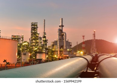Oil refinery plant sunset, power plant on sunset, twilight background