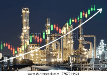 Oil refinery processing facility at night in Map Ta Phut Industrial Estate, Rayong Province, Thailand, illuminated by industrial lighting and overlaid with an upward-trending stock market candlestick chart. This composition represents the rise of fuel prices in global trade markets, highlighting growth within the international energy sector and business environment.

The scene showcases a large-scale petrochemical complex featuring distillation towers, pipelines, storage tanks, and processing units, all essential for transforming crude resources into usable products such as gasoline, diesel, and other fuels. The nighttime atmosphere emphasizes continuous operations, reflecting how energy facilities function around the clock to meet global demand.

The overlay of a bullish candlestick graph illustrates a strong upward market trend, symbolizing increasing value in energy commodities and rising costs within international markets. This growth is often driven by key factors such as supply constraints, increased consumption, geopolitical tension, and disruptions caused by conflict or war. These influences can significantly affect pricing and leading to volatility.

The refinery located in Rayong plays a crucial role in Southeast Asia’s energy supply network, supporting both regional consumption and export activities. The facility contributes to the broader industrial infrastructure, ensuring a steady flow of refined products that power transportation, manufacturing, and economic activity.

This visual highlights the connection between industrial production and financial performance, showing how real-world operations directly influence market trends, commodity pricing, and global business dynamics. Rising fuel costs can impact multiple industries, including logistics, transportation, aviation, and manufacturing, affecting both operational expenses and consumer prices.