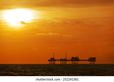 Oil Rig Silhouette On The North Sea