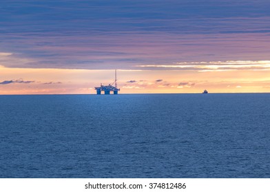 Oil Rig At Sunset In The North Sea