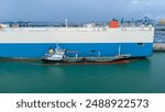 Oil ship refueling to Cargo ship at dock, Refueling at sea Oil products ship fuelling a large Bulk carrier	