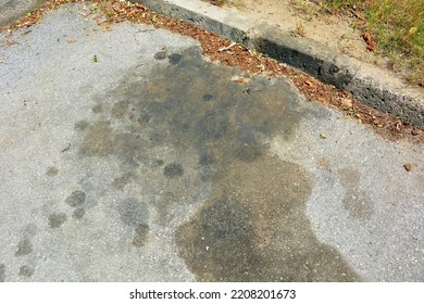 Oil Spill, Gasoline From Car On The Road