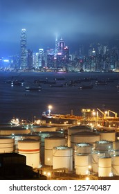 Oil Storage tanks with urban background in Hong Kong