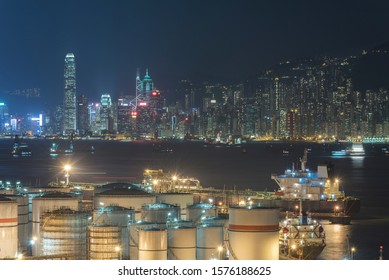 Oil tank in Victoria harbor of Hong Kong city at night