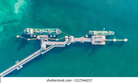 Oil Tanker, Gas Tanker In The High Sea.Refinery Industry Cargo Ship,aerial View,Thailand, In Import Export, LPG,oil Refinery, Logistics And Transportation With Working Crane Bridge In Harbor