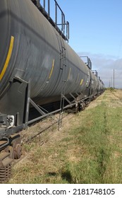 Oil Tanker Train Car On Tracks In The Countryside