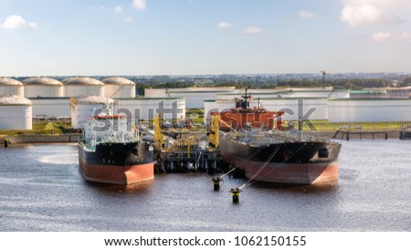 Oil tankers moored at an petrochemical oil shipping terminal in the Port of Rotterdam.
