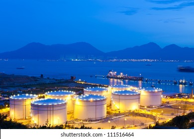 Oil Tanks At Night