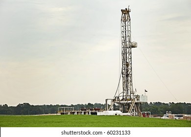 Oil Well, Rig, Field, Grass, Green, Sky, Energy, Drilling, Gray, Pump, Equipment, Swell Head, Horizontal Format,