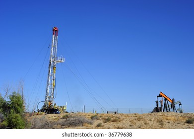 An Oil Well Servicing Rig Sets Up In Kern County California