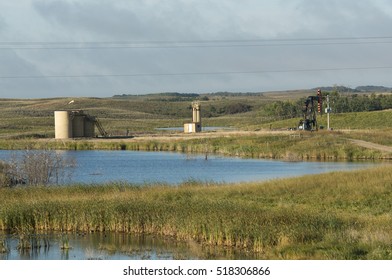 Oil Wells in North Dakota by a Wetland