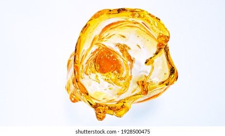 Oil in whirl shape splashing. Isolated on white background - Powered by Shutterstock